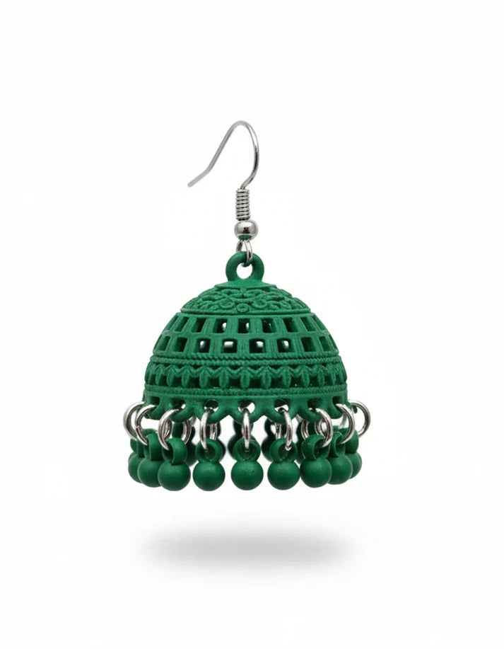 Green crochet earrings with bead embellishments on a white background