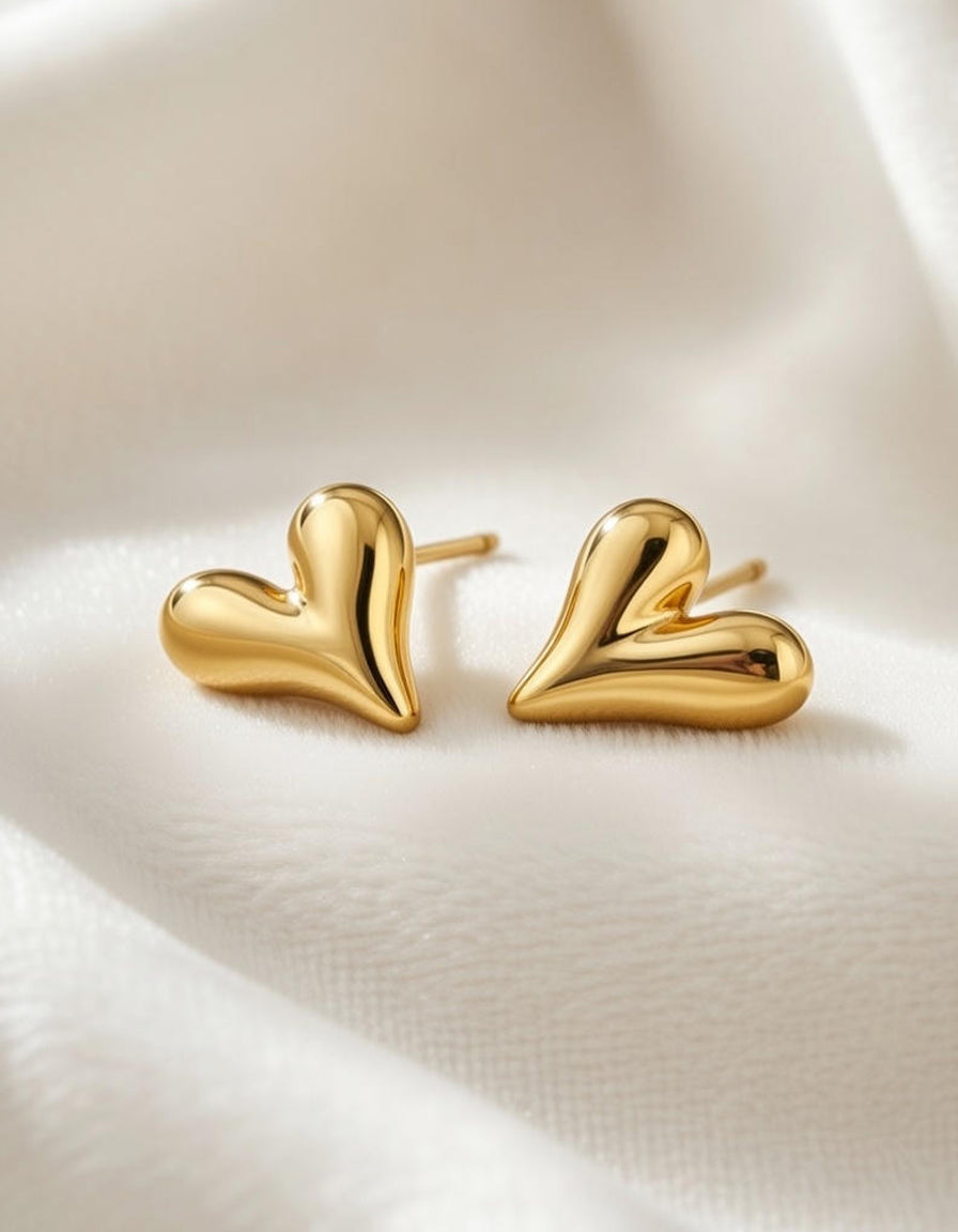 Gold stainless steel asymmetric melting heart stud earrings — Rose Dew Pakistan