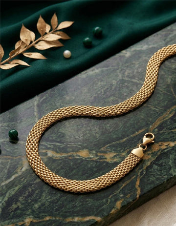 Close up of gilded gold tone mesh weave bold statement bracelet Rose Dew Pakistan
