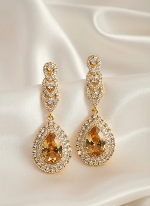 Woman wearing golden royal halo jhumka earrings wedding festive Rose Dew Pakistan