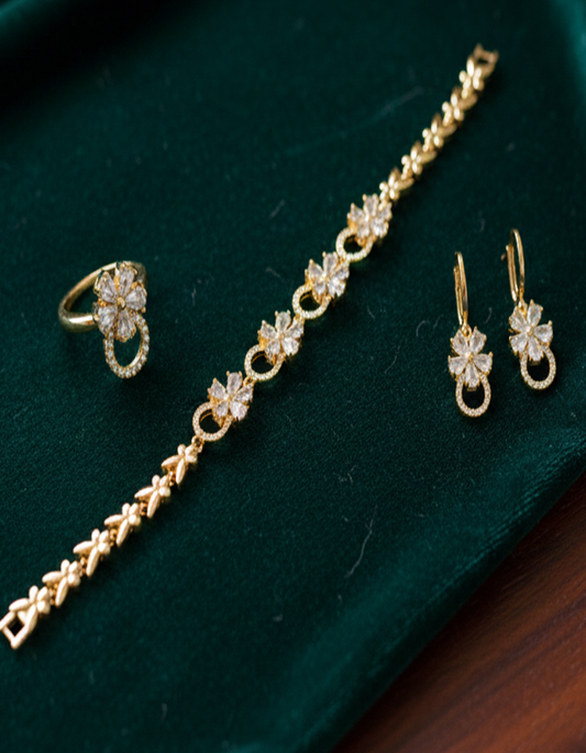 Dazzling Gold-Plated CZ Floral Jewelry Set (Bracelet, Earrings, Ring)