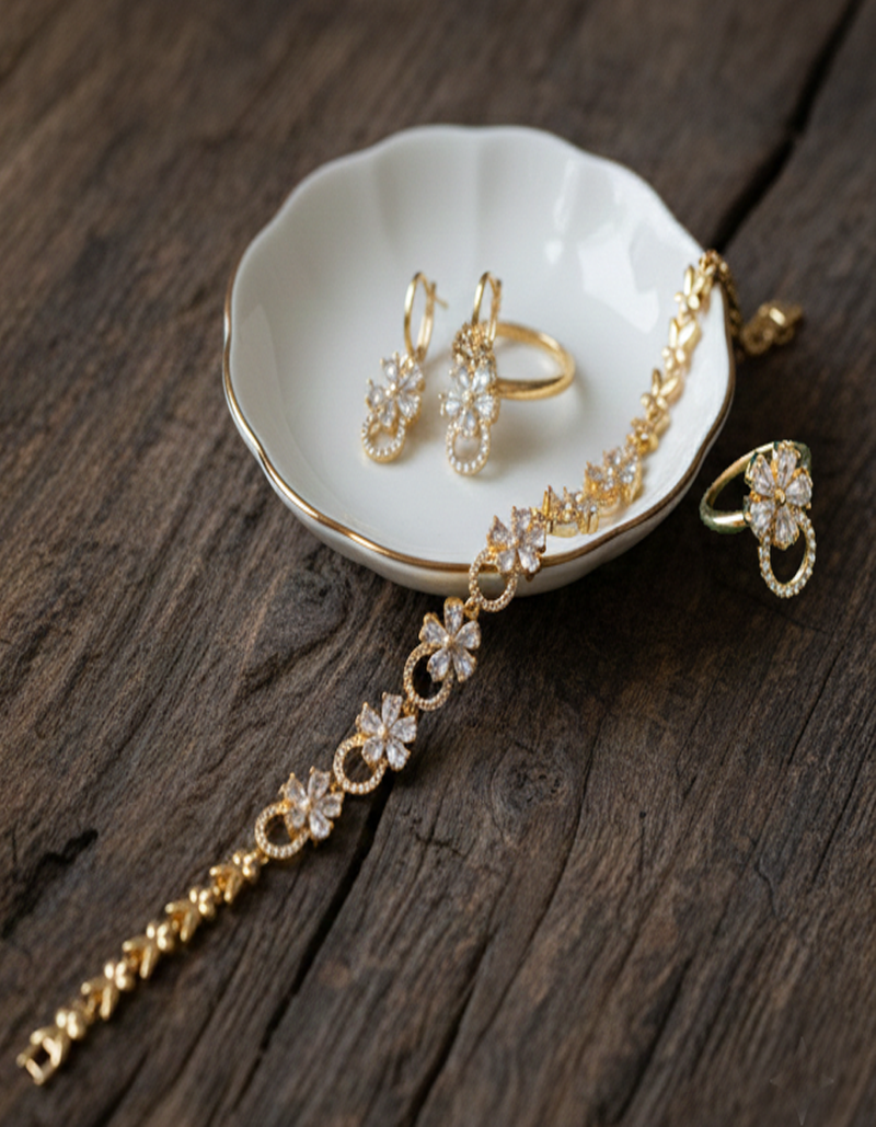 Dazzling Gold-Plated CZ Floral Jewelry Set (Bracelet, Earrings, Ring)