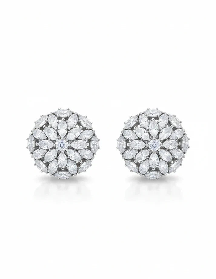 Pair of diamond earrings on a white background