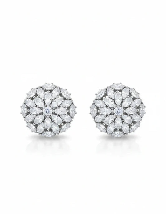 Pair of diamond earrings on a white background