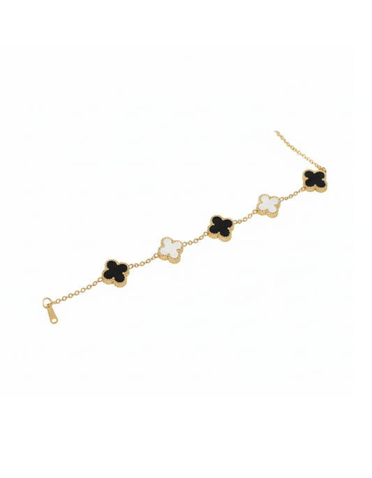 Gold bracelet with clover-shaped charms on a white background