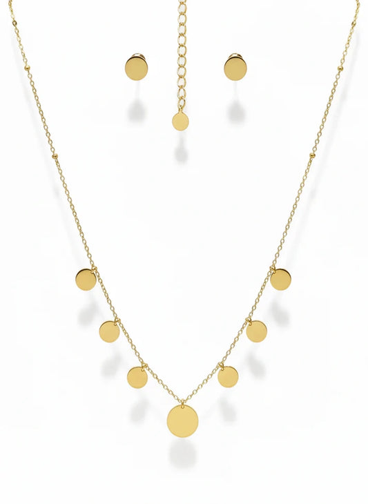 Gold necklace and earrings on a white background
