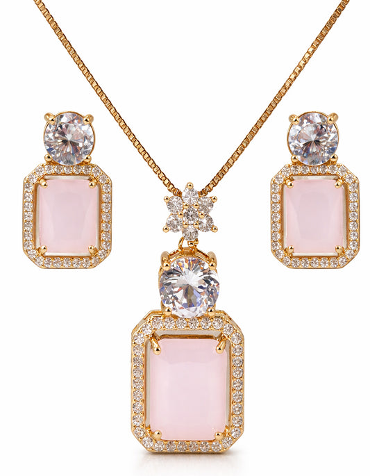 Jewelry set with pink stones and gold accents on a white background
