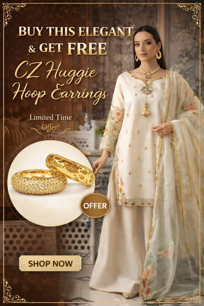 Woman in traditional outfit with CZ Huggie Hoop Earrings offer on a decorative background