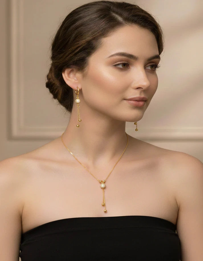 Golden sphere pavé crystal tassel earrings gold drop detail Rose Dew Pakistan