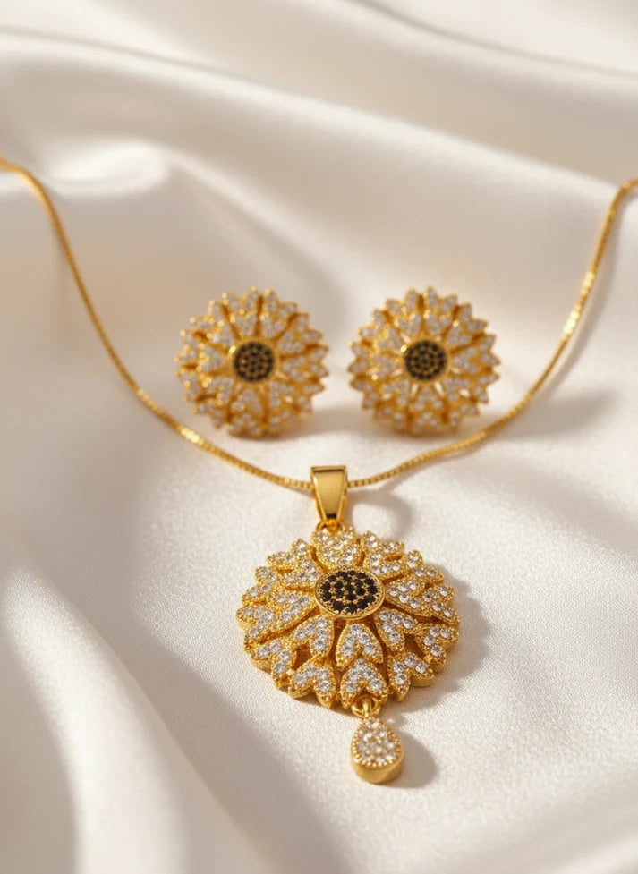 Golden sunburst round medallion pendant necklace crystal pavé teardrop Rose Dew Pakistan