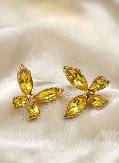 Close up golden butterfly stud earrings four wing faceted crystal motif Rose Dew Pakistan