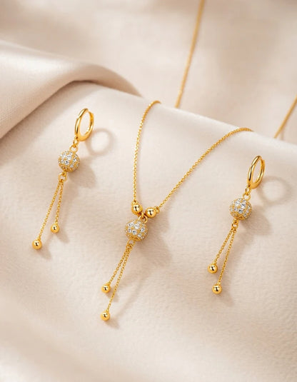 Golden sphere pavé crystal ball pendant necklace triple gold tassel Rose Dew Pakistan