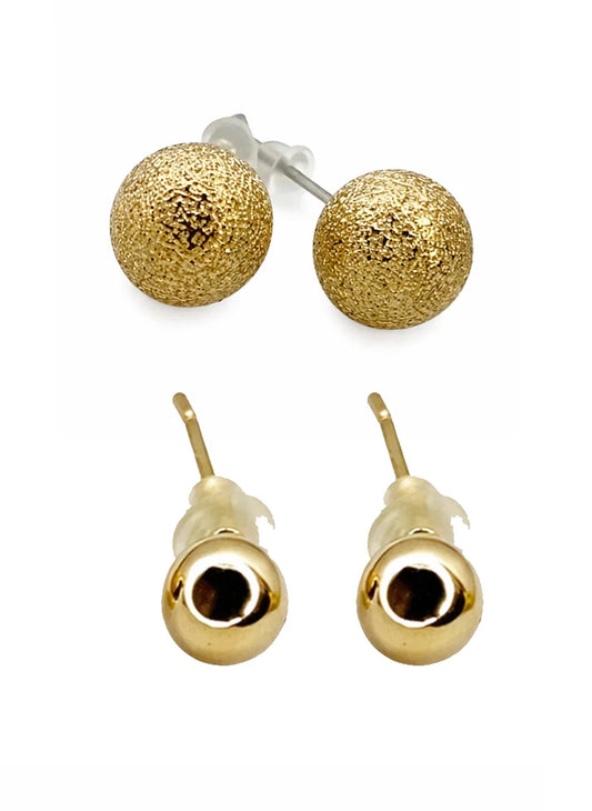 Woman wearing golden sphere stud earrings minimal style Rose Dew Pakistan