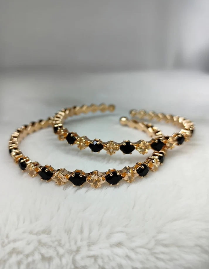 Close up midnight onyx black stone gold star motif adjustable bangle Rose Dew Pakistan
