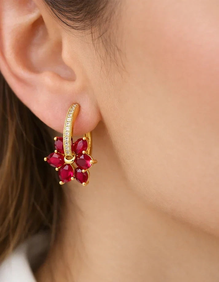 Woman wearing ruby red floral huggie drop earrings for wedding — Rose Dew Pakistan